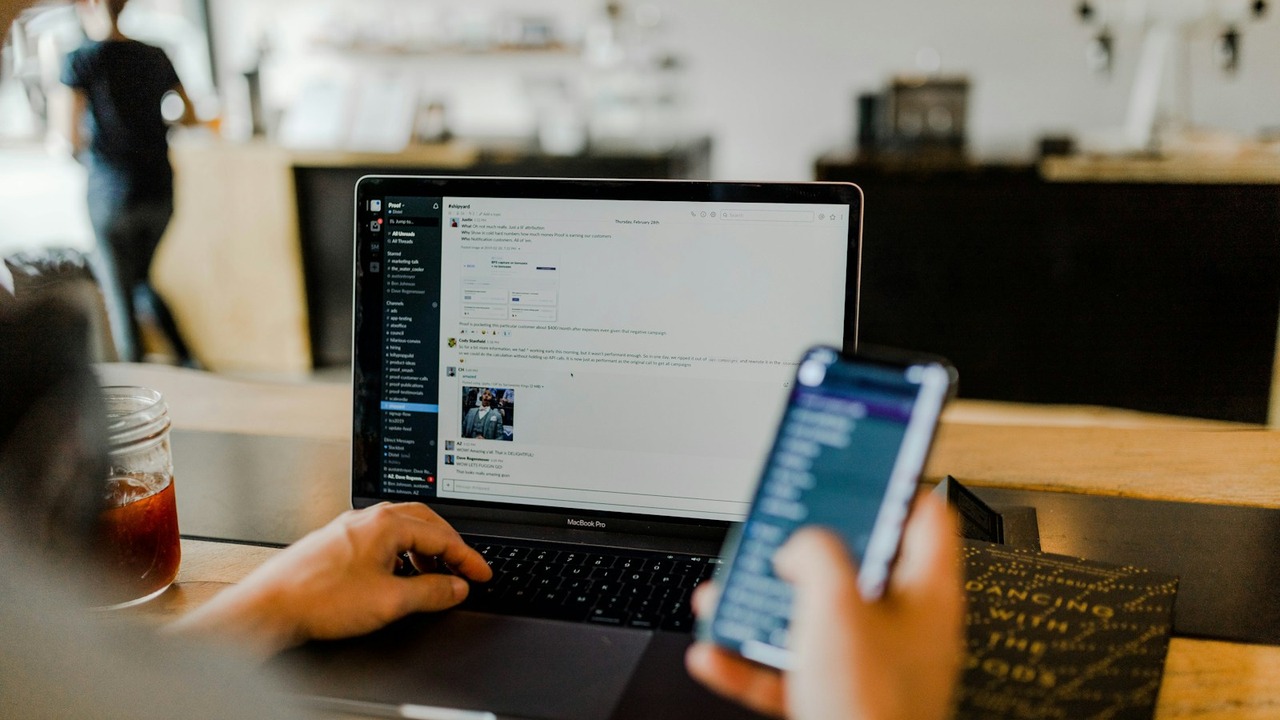 Professional verifying mobile banking security and biometric authentication on smartphone